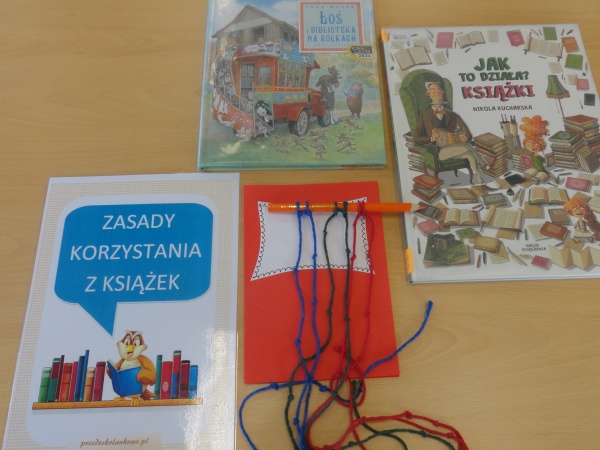 Zajęcia czytelnicze i plastyczne z grupą przedszkolną na podstawie książek I.Moore "Łoś i biblioteka na kółkach" oraz N.Kucharskiej "Jak to działa: książki" - 2026.05.12 - Filia nr 4
